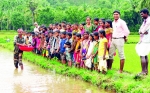 വിത്തും കൈക്കോട്ടുമായി കുട്ടികള്‍ പാടത്ത് 